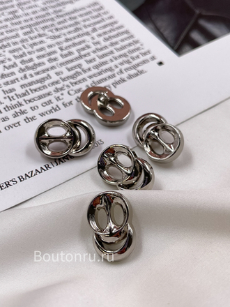 Пуговицы Скиапар. серебристые в форме проколотого носа