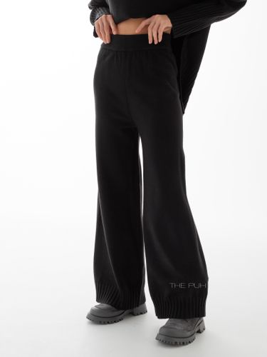 Черный трикотажный костюм с широкими резинками