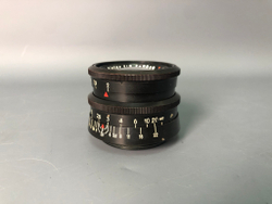 Praktica + Biometar 5,8cm 1:2, зеркало исцарапано, присутствуют пузырьки воздуха.