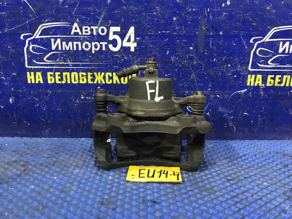 Суппорт тормозной передний левый NISSAN BLUEBIRD 1997