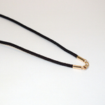 Гайтан с золотыми наконечниками.