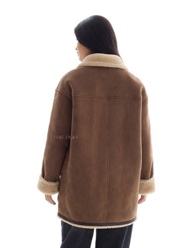 Коричневая дубленка с петлевыми застёжками