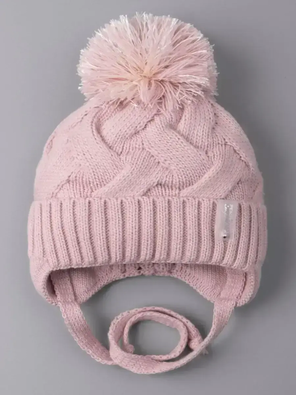 Шапка для девочки на завязках на осень