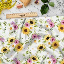 Ткань лён разноцветные ромашки и подсолнухи на белом фоне