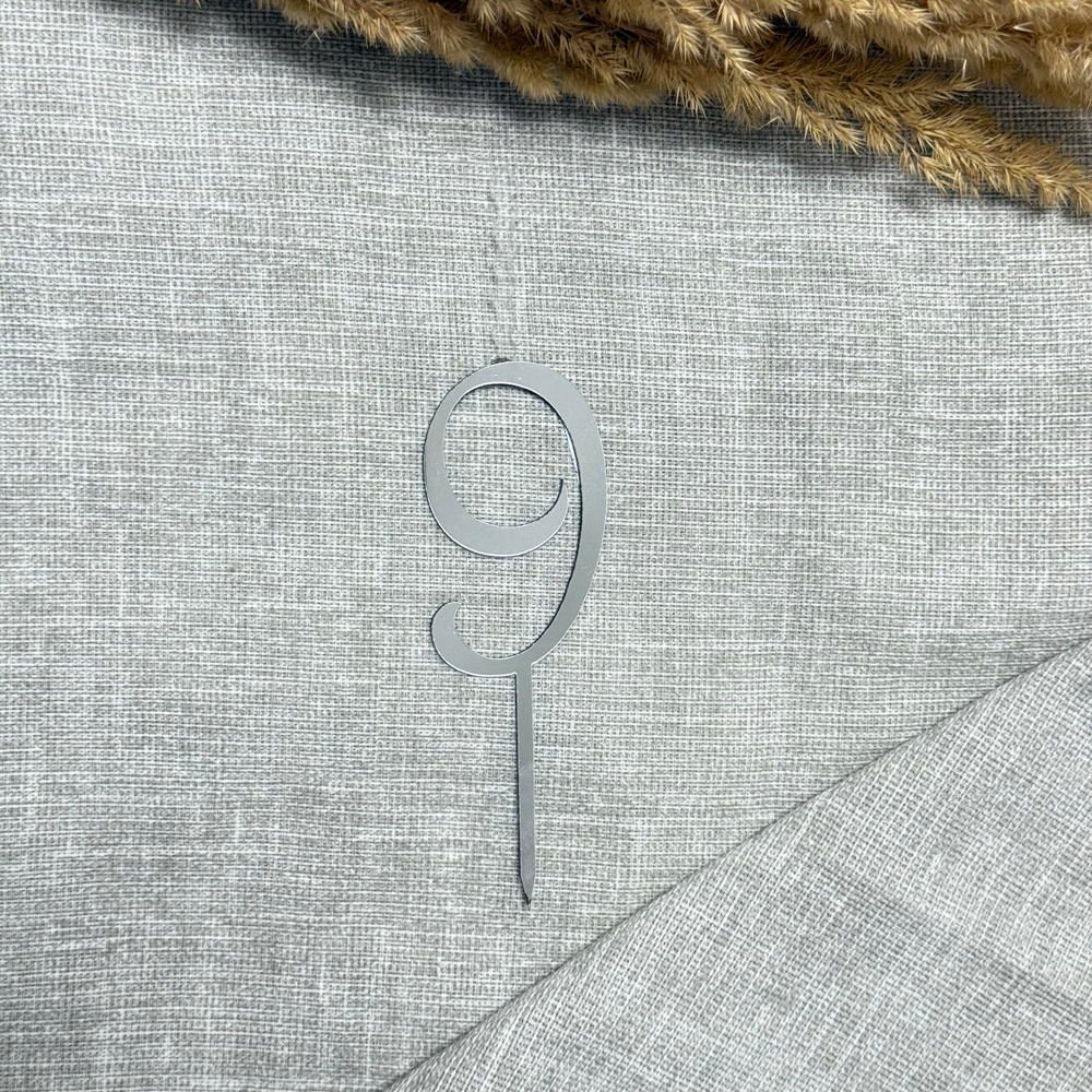 Свеча-топпер цифра «9» в серебряном цвете