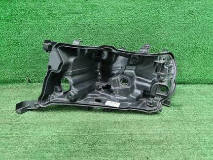 Корпус фары левый Toyota Land Cruiser 200 (15-21)