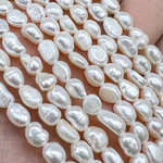 Жемчуг 2А речной бусины 5-6 мм, на нитке 38 см