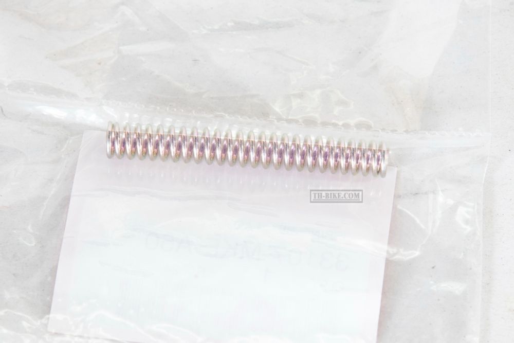 33107-MKE-A50. SPRING, BEAM ADJUST. Honda