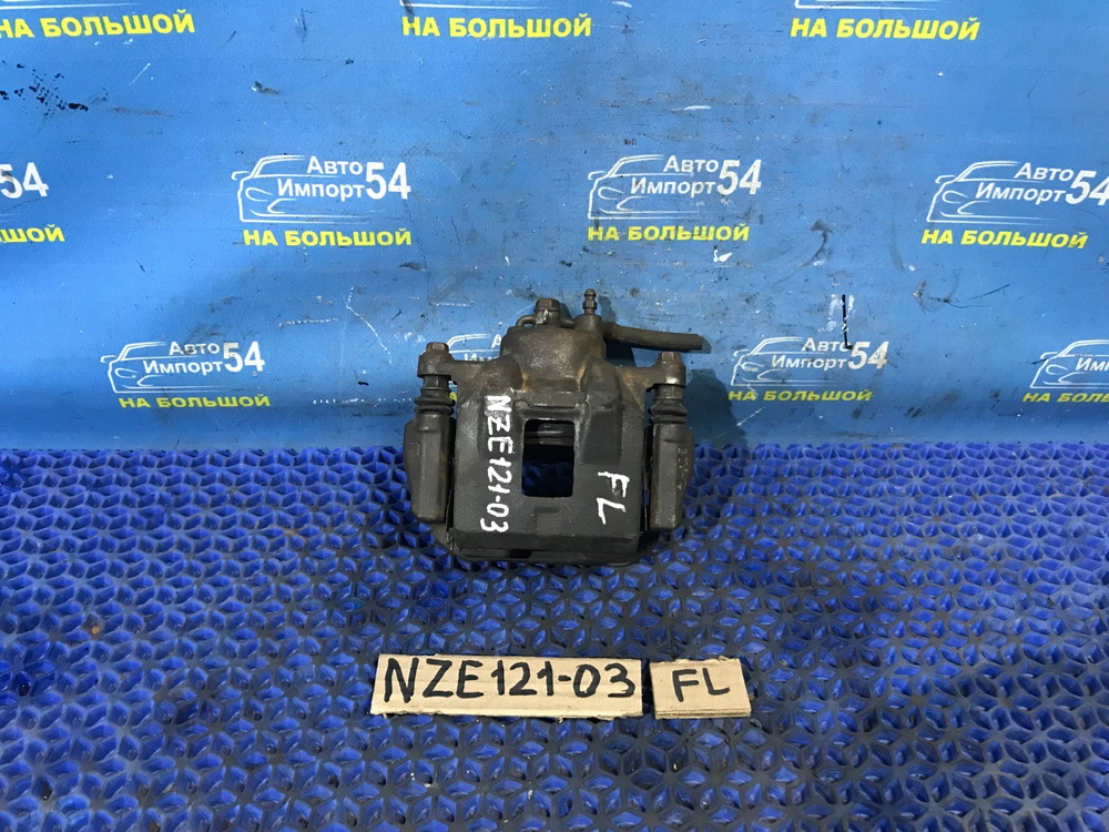 Суппорт тормозной передний левый TOYOTA FIELDER 2002