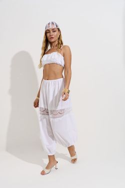 Брюки алладины из жатого хлопка белого цвета с кружевом