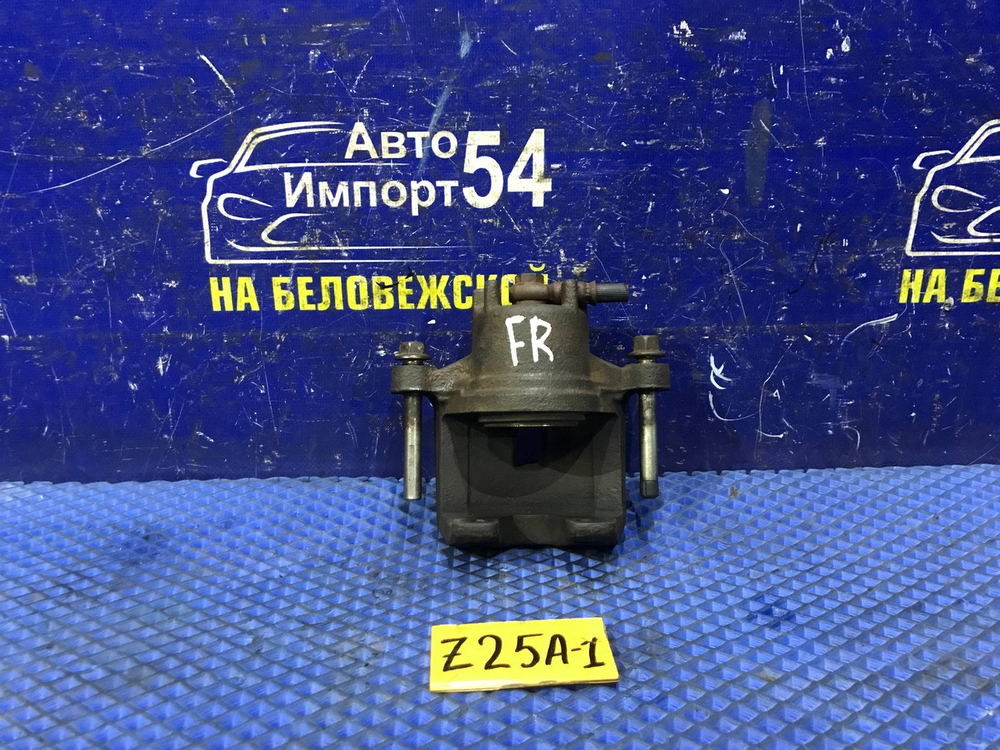 Суппорт тормозной передний правый MITSUBISHI COLT 2003