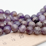 Аметист с включениями, диаметр 8,1-8,4 мм, цена за 22-23 шт (1/2 нити)