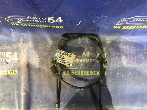 Трос ручника левый MITSUBISHI LANCER 1993