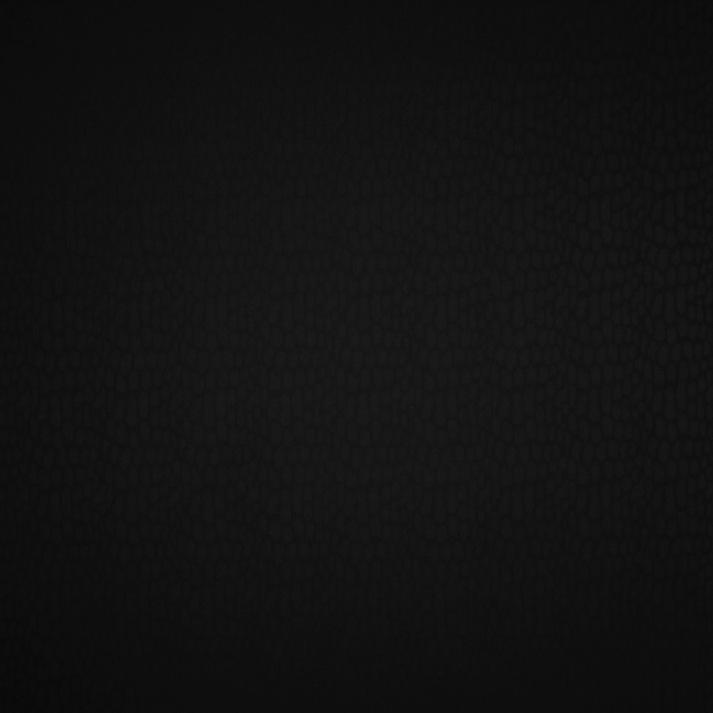 Костюмная ткань из шерсти с эластаном с леопардовыми пятнами в чёрном цвете