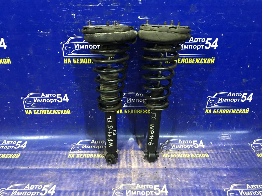 Стойка передняя правая NISSAN PRIMERA 1997