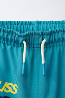 ZARA ПЛАВКИ КЛАССИЧЕСКОГО КРОЯ С НАДПИСЬЮ, ЗЕЛЕНЫЙ