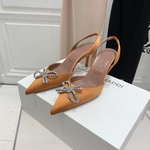 Amina Muaddi Pumps