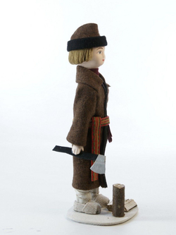 Фарфоровая кукла коллекционная Юный дровосек в зимней крестьянской одежде