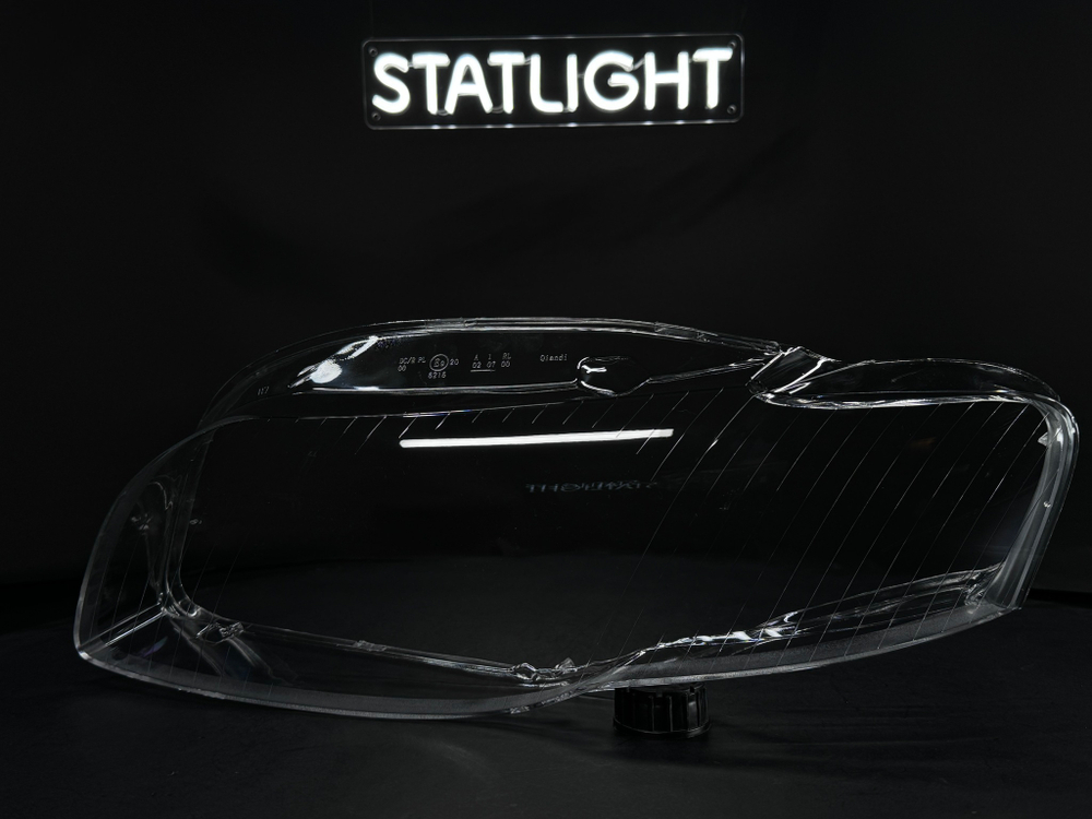 Левое стекло фары AUDI A4 B7 2004-2009