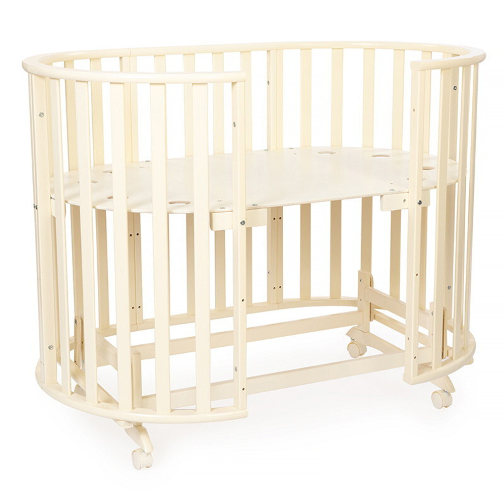 Кроватка-трансформер овальная Vikalex Лоди маятник на колёсах слоновая кость