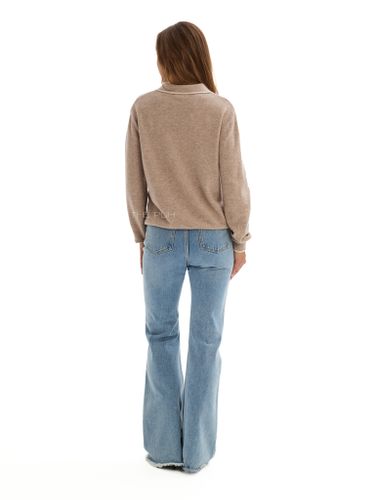 Темно-бежевое поло с длинным рукавом из шерсти