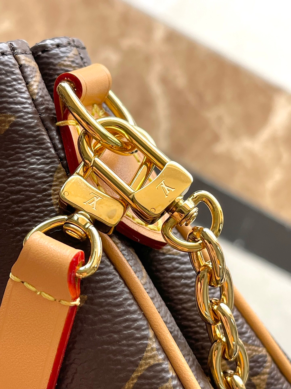 Louis Vuitton Liv Pochette