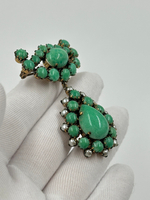 Брошь с зелёными вставками