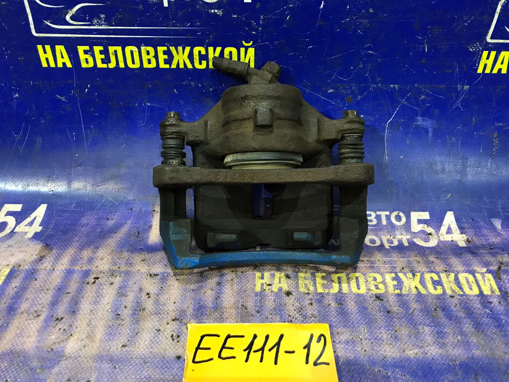 Суппорт тормозной передний левый TOYOTA COROLLA 1999