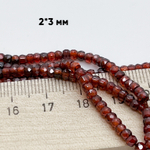 Фианит, рондель с огранкой, цвет коричнево-красный, размер около 3,1*2,3 мм, цена за нить 38 см (около 165 шт)