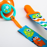 5421484 Держатель для соски - пустышки на ленте «Монстрики»