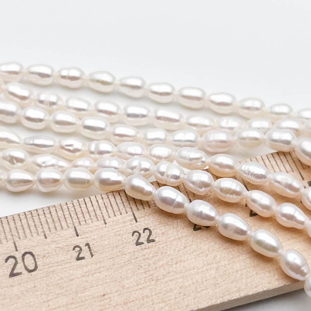 Жемчуг, размер около 5,2-5,5*3,8-4 мм, цена за отрезок 17 см (1/2 нити)