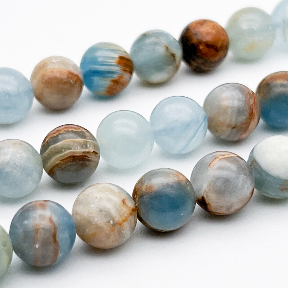 Кальцит бусины, диаметр около 10-10,1 мм, цена за 9 шт (1/4 нити)