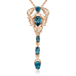 Подвеска «Скорпион» из красного золота с топазами