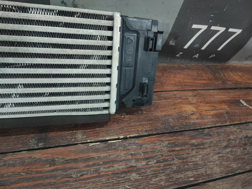 Интеркулер Geely Tugella 19-нв Б/У Оригинал 2074089900