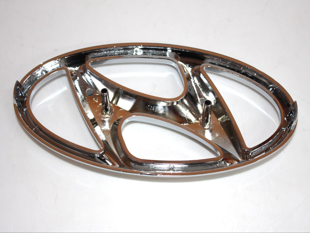 Эмблема решетки радиатора 863594L500 для Hyundai Solaris