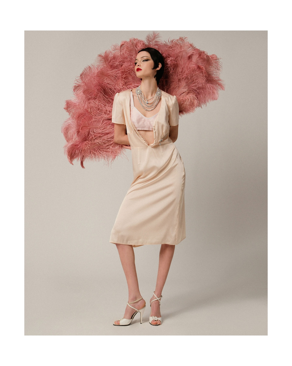 Веер из страусиных перьев