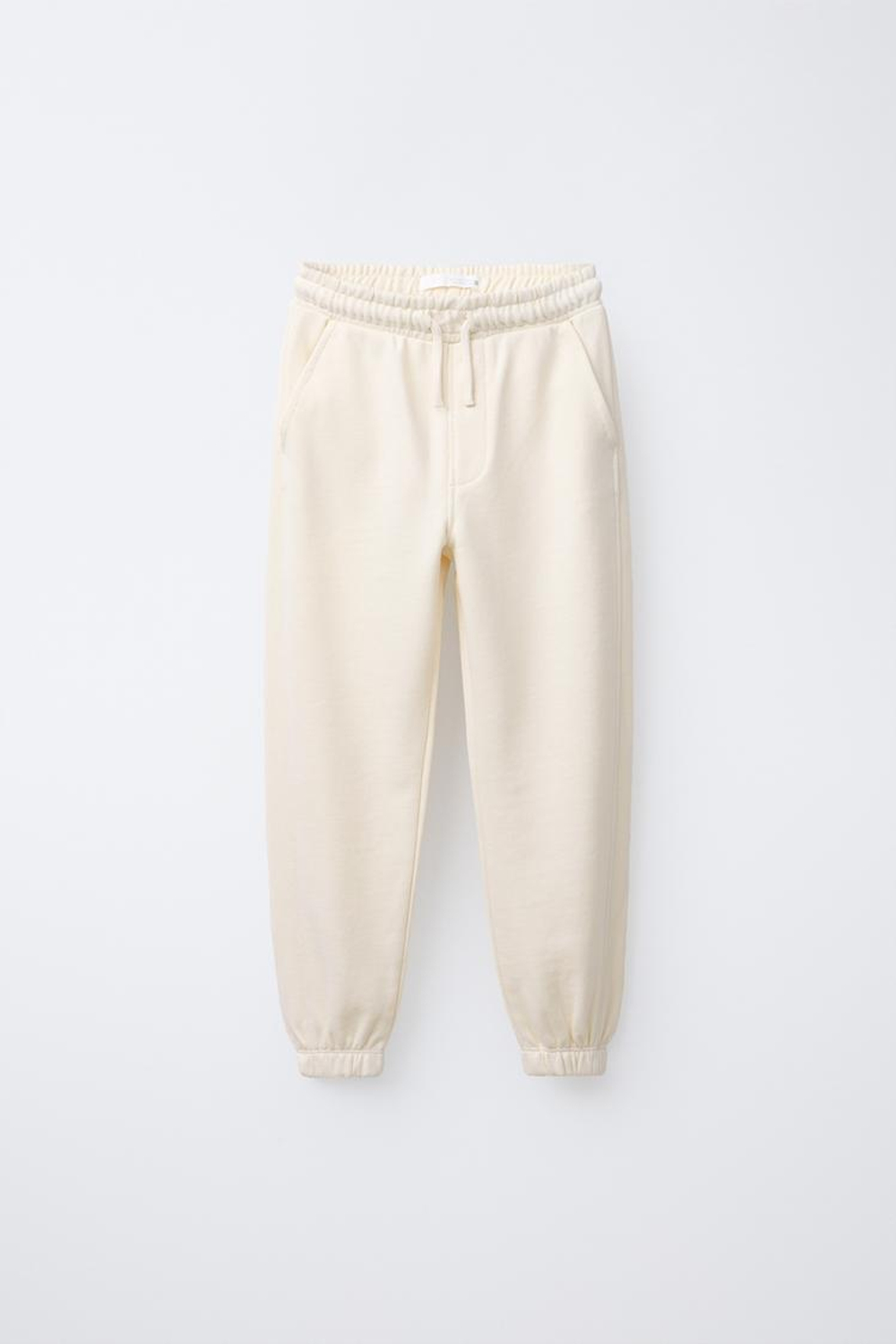 ZARA КОМПЛЕКТ ИЗ ФУТБОЛКИ И БРЮК-ДЖОГГЕРОВ С НАДПИСЬЮ, ЭКРЮ