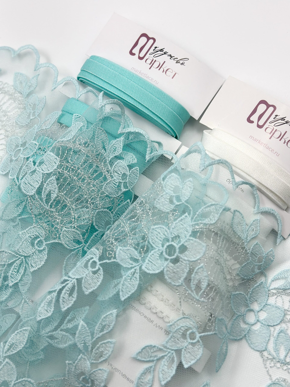 Вышивка на сетке светлый тиффани с серебристым люрексом неэластичная ширина 25 см