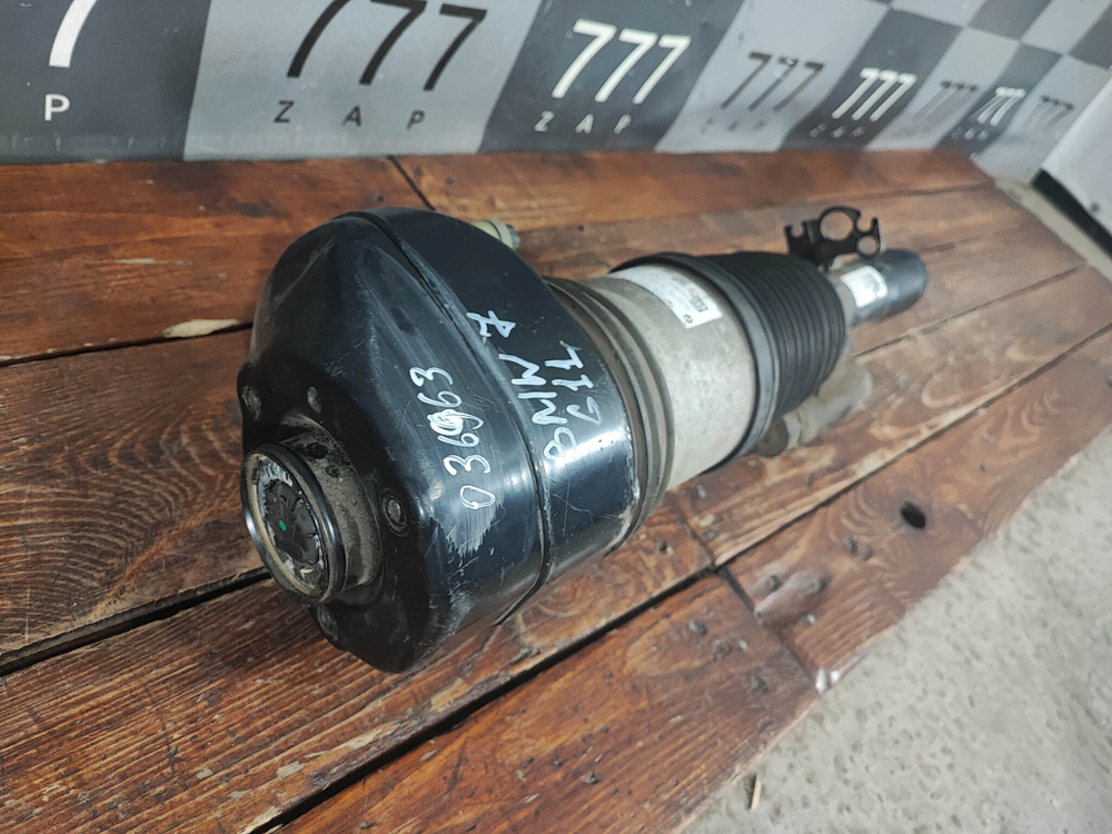 Амортизатор передний левый BMW 7-Series (G11) 15-22 Б/У Оригинал 77687755905