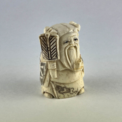 Статуэтка нэцкэ Чжан Голао – воплощение мудрости