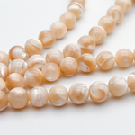 Перламутр тонированный, цвет бежевый, диаметр около 6,5-6,7 мм, цена за 28-29 шт (1/2 нити)