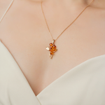 Подвеска «Облепиха» из красного золота с янтарём