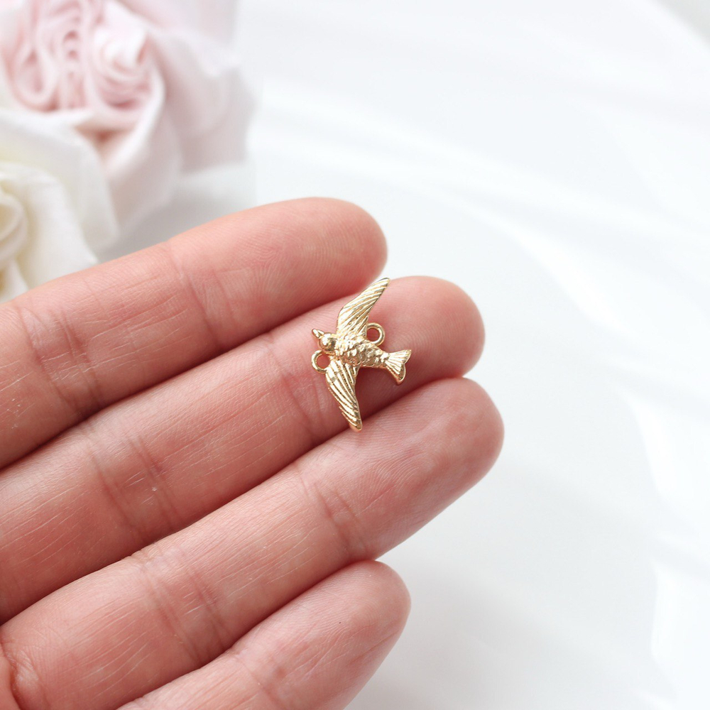 п576-з Коннектор "Птичка" 20*13мм, позолота