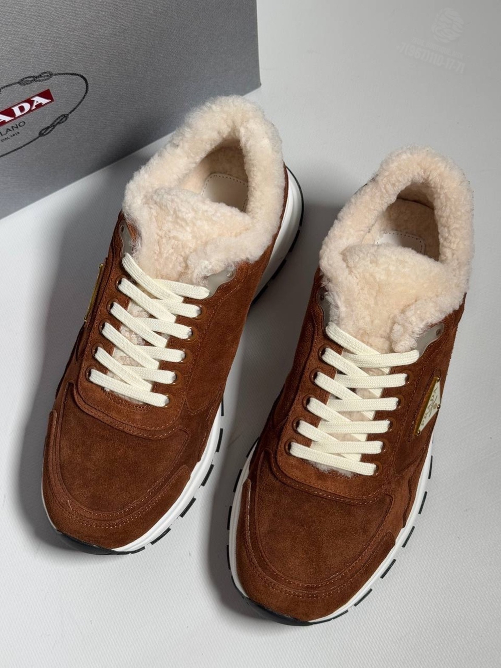 Кроссовки Prada