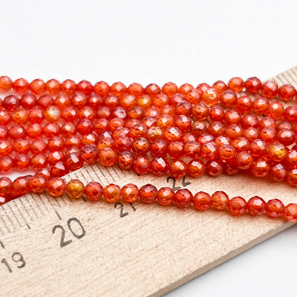Фианит (кубический цирконий), цвет огненно-красный, размер 3 мм, цена за нить около 130 шт (38 см)