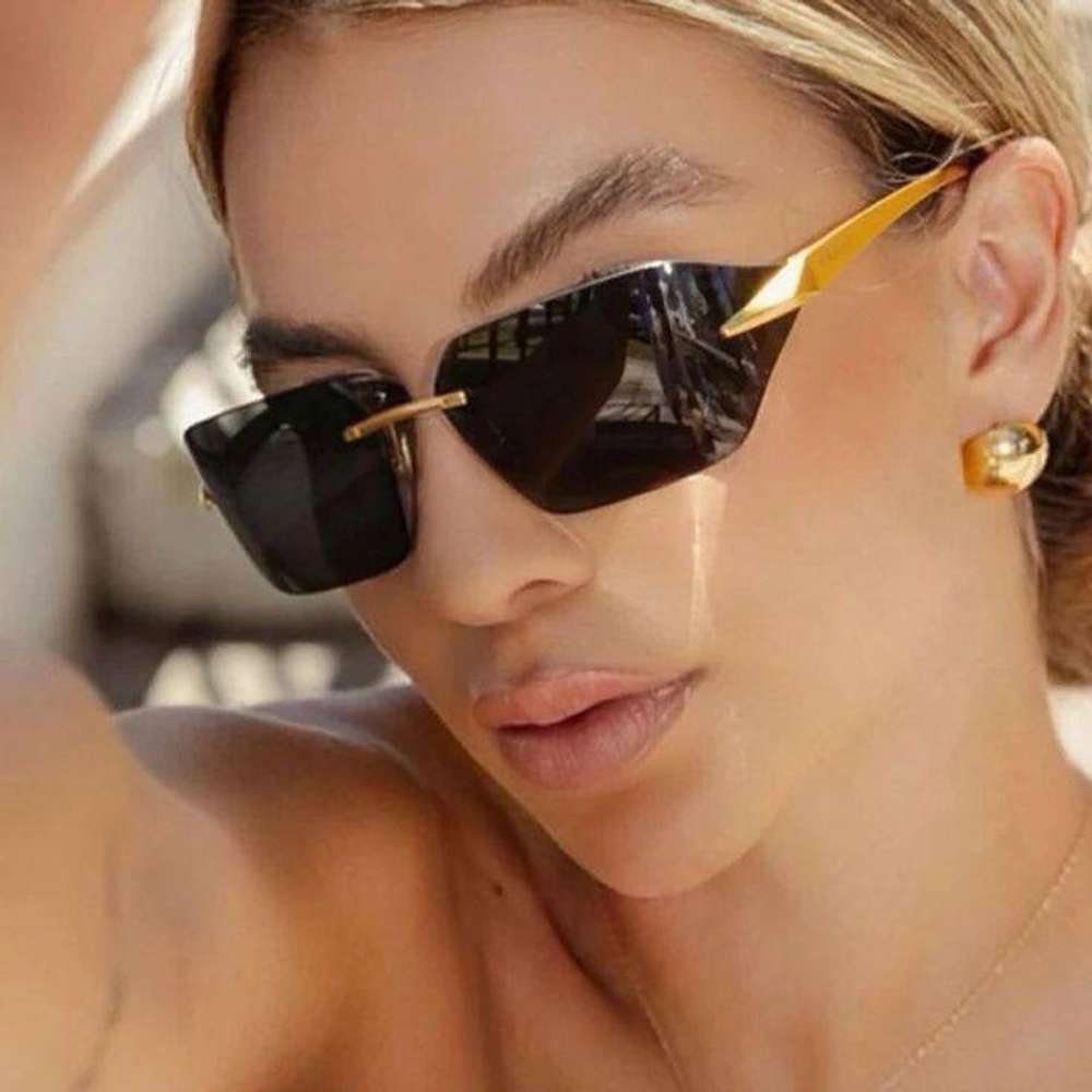 Солнцезащитные очки Prada