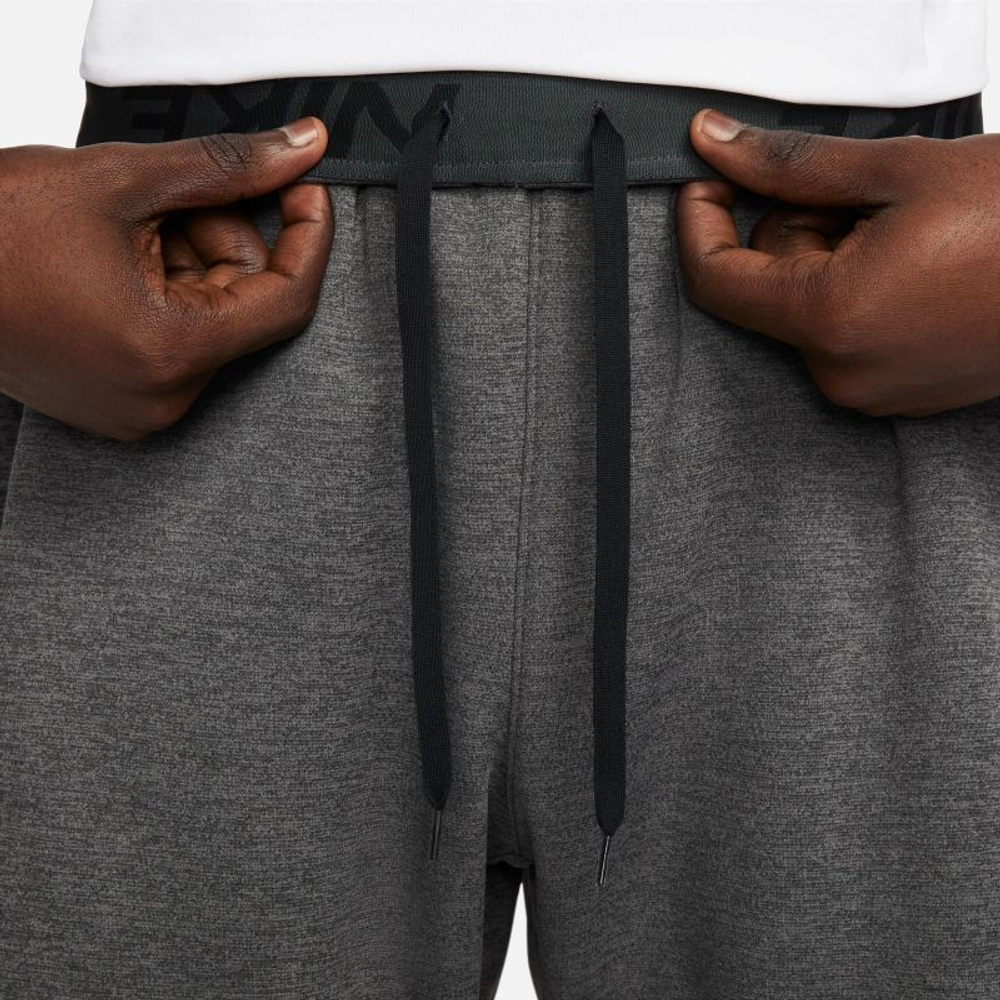 Теннисные брюки Nike Therma-FIT Tapered Fitness Pants - charcoal heather/dark smoke grey/black