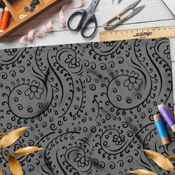 Ткань интерлок чёрные цветы и листья на коричневом фоне