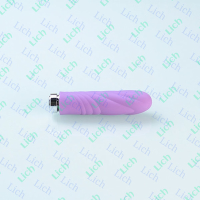 Сиреневый вибромассажер с волнистой поверхностью Charms Key