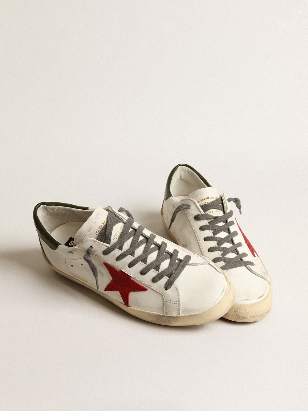 Men's Super Star with red suede star and green leather heel tab